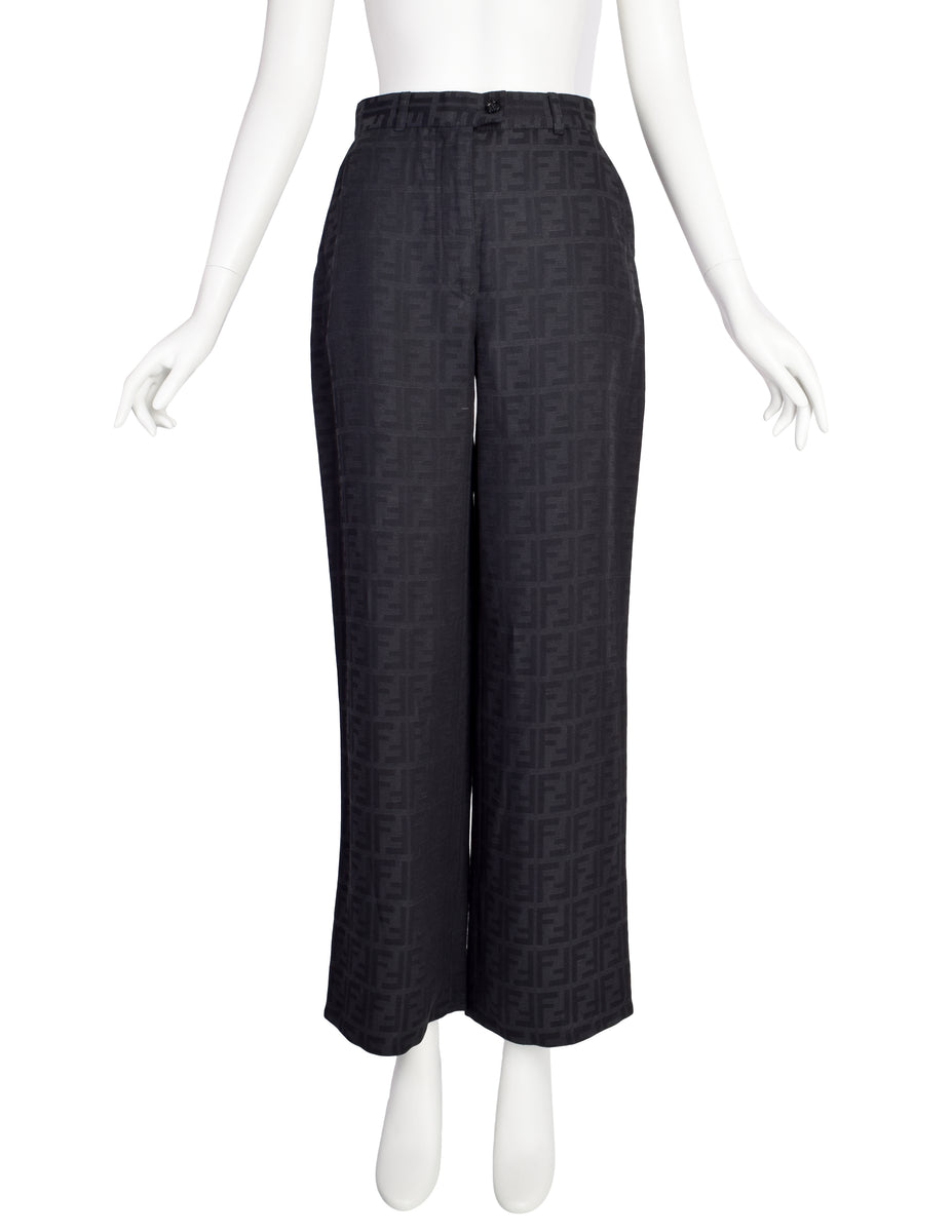 Vintage Fendi tonal black wide-leg pants photographed on a white background.